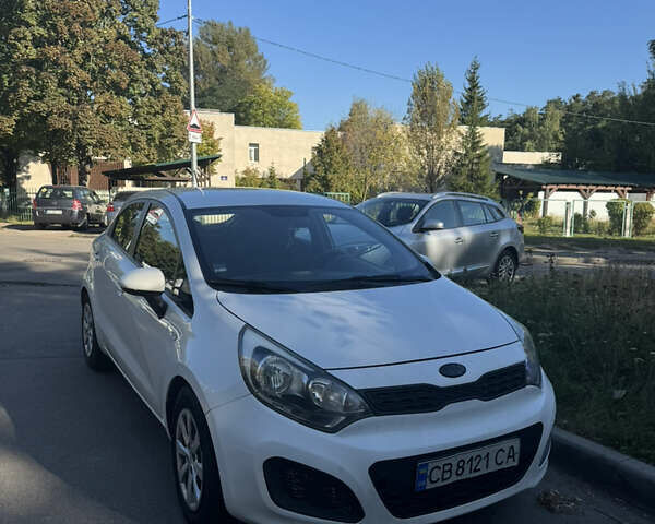 Белый Киа Рио, объемом двигателя 1.25 л и пробегом 172 тыс. км за 5999 $, фото 1 на Automoto.ua