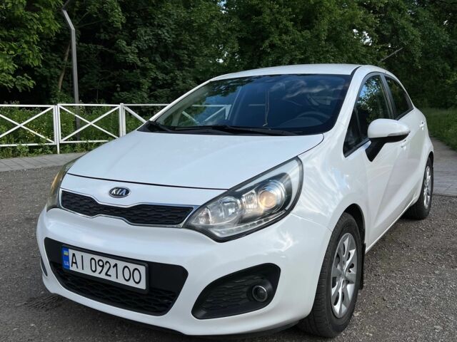 Белый Киа Рио, объемом двигателя 1.1 л и пробегом 212 тыс. км за 5800 $, фото 1 на Automoto.ua