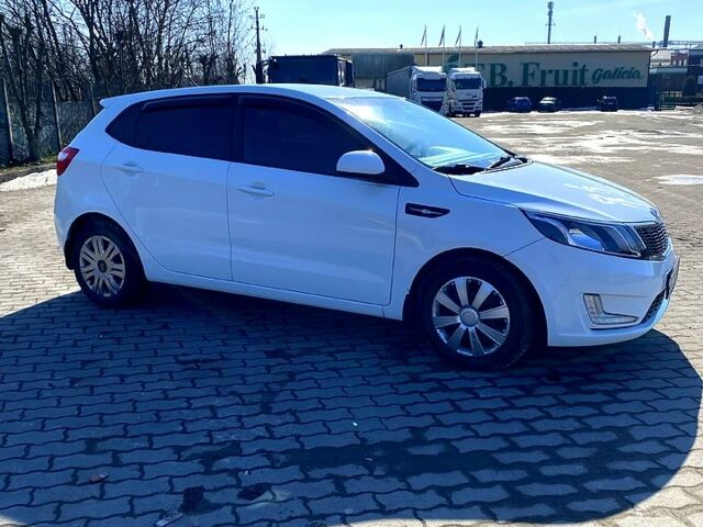 Белый Киа Рио, объемом двигателя 1.4 л и пробегом 102 тыс. км за 6850 $, фото 1 на Automoto.ua