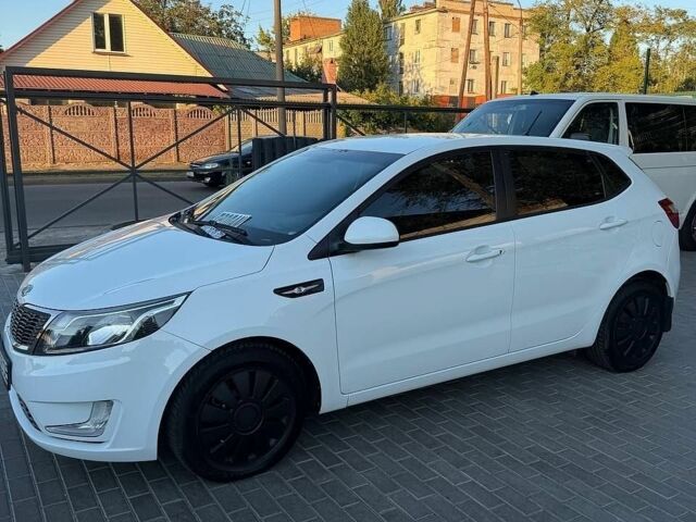 Білий Кіа Ріо, об'ємом двигуна 1.59 л та пробігом 168 тис. км за 7400 $, фото 1 на Automoto.ua