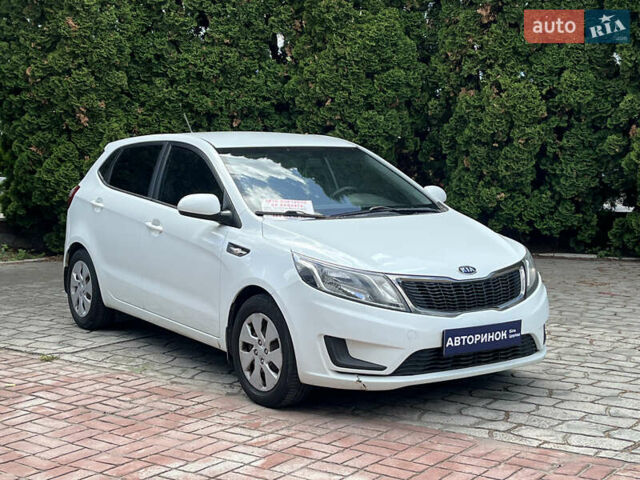 Білий Кіа Ріо, об'ємом двигуна 1.4 л та пробігом 279 тис. км за 7200 $, фото 1 на Automoto.ua