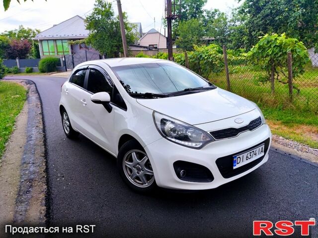 Белый Киа Рио, объемом двигателя 1.4 л и пробегом 282 тыс. км за 6999 $, фото 1 на Automoto.ua