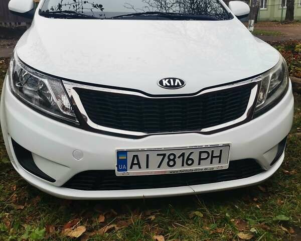 Белый Киа Рио, объемом двигателя 1.4 л и пробегом 159 тыс. км за 7400 $, фото 1 на Automoto.ua