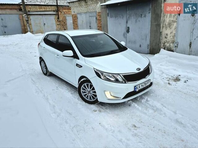 Білий Кіа Ріо, об'ємом двигуна 1.4 л та пробігом 132 тис. км за 8800 $, фото 1 на Automoto.ua