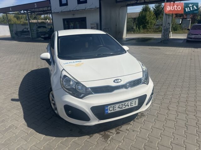Белый Киа Рио, объемом двигателя 1.12 л и пробегом 289 тыс. км за 5800 $, фото 1 на Automoto.ua