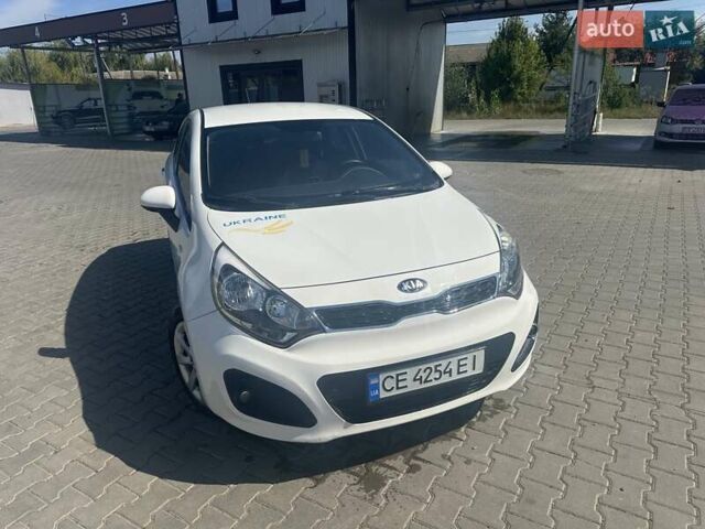 Белый Киа Рио, объемом двигателя 1.12 л и пробегом 289 тыс. км за 6300 $, фото 1 на Automoto.ua