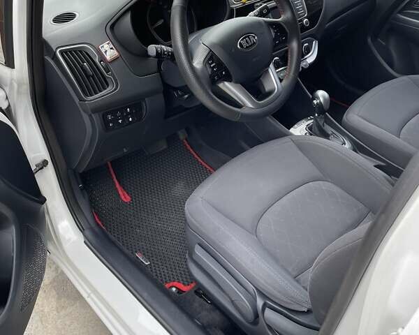 Белый Киа Рио, объемом двигателя 1.4 л и пробегом 94 тыс. км за 11200 $, фото 1 на Automoto.ua