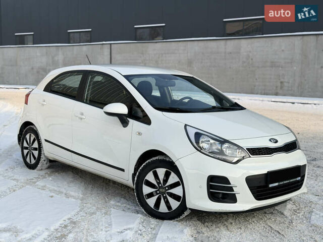 Білий Кіа Ріо, об'ємом двигуна 1.4 л та пробігом 65 тис. км за 12700 $, фото 1 на Automoto.ua