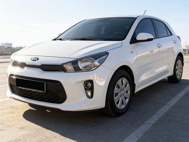 Белый Киа Рио, объемом двигателя 1.25 л и пробегом 69 тыс. км за 9900 $, фото 1 на Automoto.ua