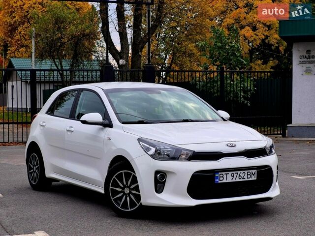 Білий Кіа Ріо, об'ємом двигуна 1.25 л та пробігом 91 тис. км за 8500 $, фото 1 на Automoto.ua