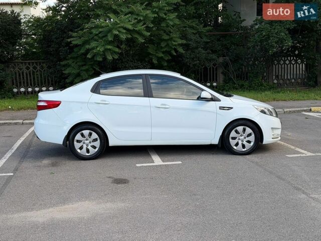 Білий Кіа Ріо, об'ємом двигуна 1.4 л та пробігом 157 тис. км за 6200 $, фото 1 на Automoto.ua