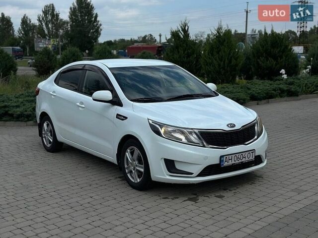 Білий Кіа Ріо, об'ємом двигуна 1.4 л та пробігом 217 тис. км за 6900 $, фото 1 на Automoto.ua