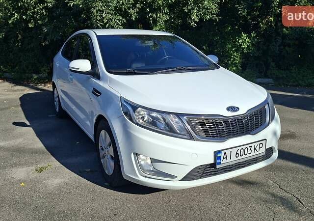 Белый Киа Рио, объемом двигателя 1.59 л и пробегом 210 тыс. км за 6800 $, фото 1 на Automoto.ua