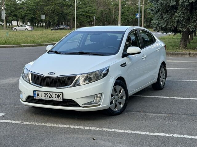 Белый Киа Рио, объемом двигателя 1.4 л и пробегом 157 тыс. км за 6400 $, фото 1 на Automoto.ua