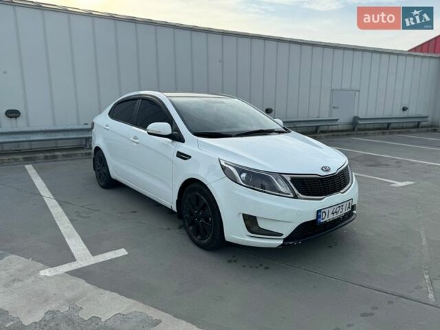 Белый Киа Рио, объемом двигателя 1.59 л и пробегом 257 тыс. км за 6999 $, фото 1 на Automoto.ua
