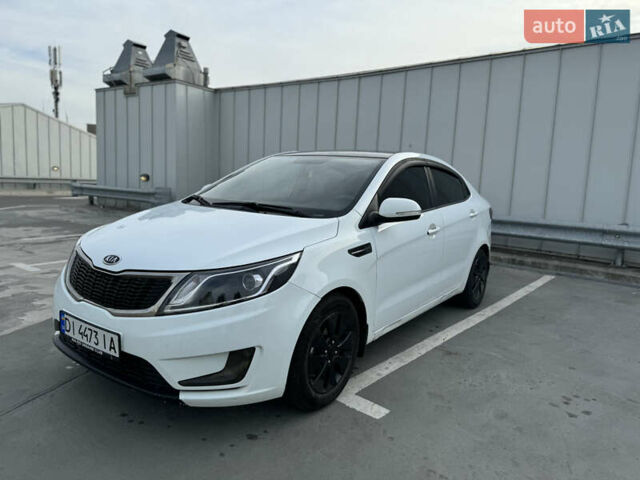 Белый Киа Рио, объемом двигателя 1.6 л и пробегом 253 тыс. км за 7400 $, фото 1 на Automoto.ua