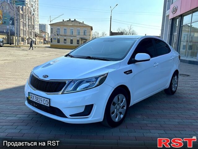 Белый Киа Рио, объемом двигателя 1.4 л и пробегом 231 тыс. км за 6750 $, фото 1 на Automoto.ua