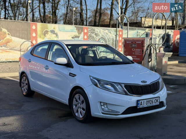 Белый Киа Рио, объемом двигателя 1.4 л и пробегом 157 тыс. км за 6500 $, фото 1 на Automoto.ua