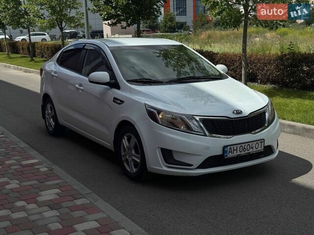 Белый Киа Рио, объемом двигателя 1.4 л и пробегом 219 тыс. км за 6400 $, фото 1 на Automoto.ua
