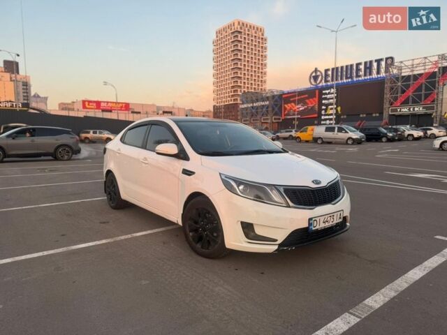 Белый Киа Рио, объемом двигателя 1.59 л и пробегом 257 тыс. км за 7600 $, фото 1 на Automoto.ua
