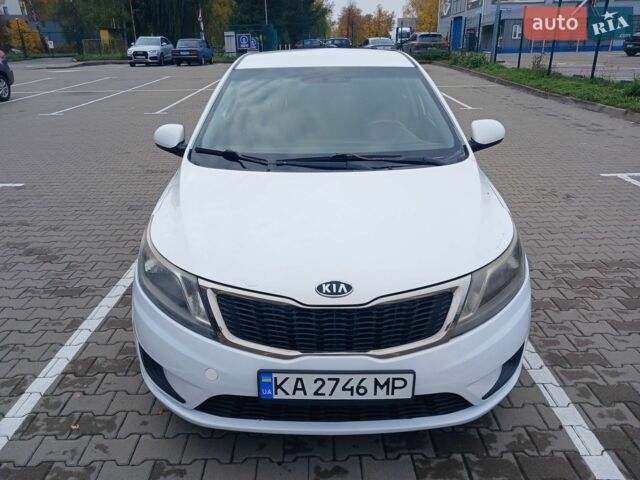 Білий Кіа Ріо, об'ємом двигуна 1.4 л та пробігом 230 тис. км за 5300 $, фото 1 на Automoto.ua