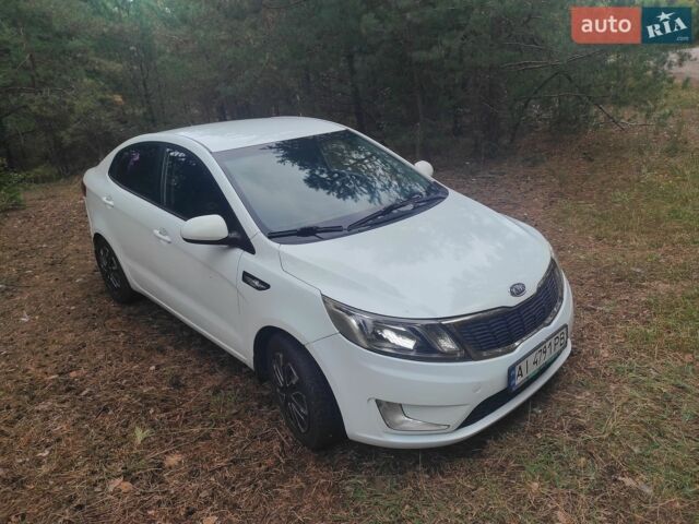 Белый Киа Рио, объемом двигателя 1.4 л и пробегом 253 тыс. км за 7050 $, фото 1 на Automoto.ua