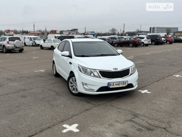 Белый Киа Рио, объемом двигателя 1.59 л и пробегом 293 тыс. км за 7000 $, фото 1 на Automoto.ua