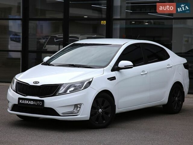 Білий Кіа Ріо, об'ємом двигуна 1.6 л та пробігом 127 тис. км за 8600 $, фото 1 на Automoto.ua