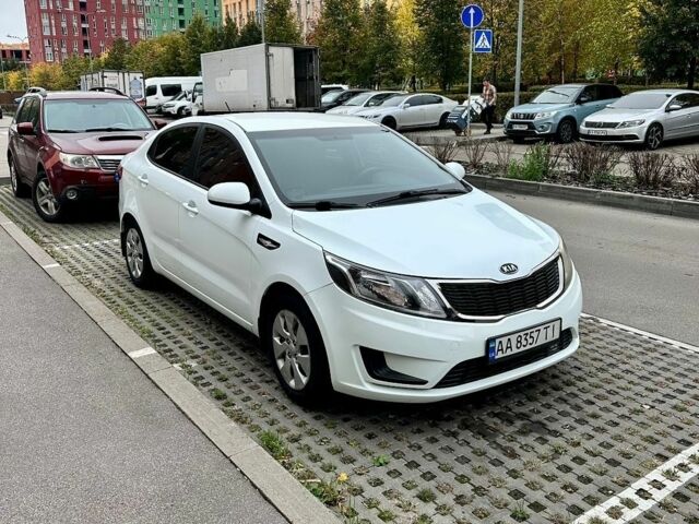 Білий Кіа Ріо, об'ємом двигуна 1.4 л та пробігом 118 тис. км за 6899 $, фото 1 на Automoto.ua