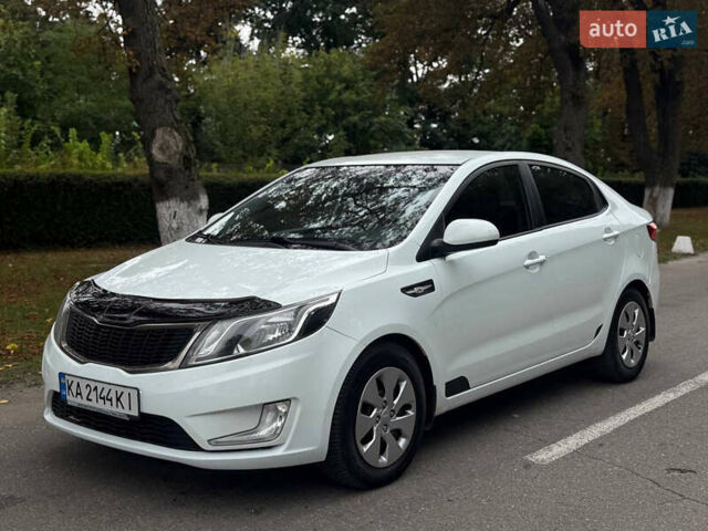 Білий Кіа Ріо, об'ємом двигуна 1.6 л та пробігом 228 тис. км за 7450 $, фото 1 на Automoto.ua