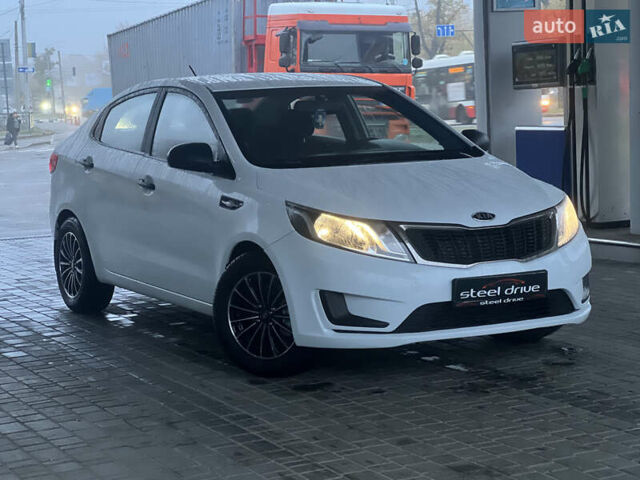 Белый Киа Рио, объемом двигателя 1.4 л и пробегом 150 тыс. км за 6499 $, фото 1 на Automoto.ua