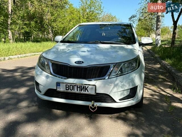 Белый Киа Рио, объемом двигателя 1.4 л и пробегом 131 тыс. км за 8999 $, фото 1 на Automoto.ua