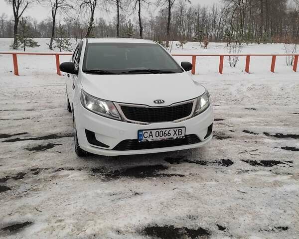 Белый Киа Рио, объемом двигателя 1.4 л и пробегом 98 тыс. км за 8600 $, фото 1 на Automoto.ua