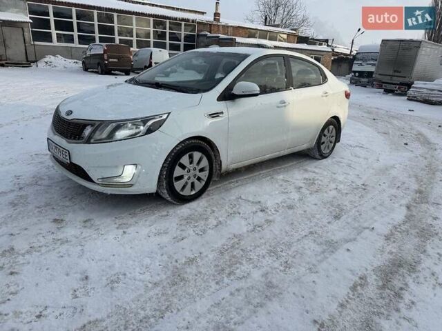 Білий Кіа Ріо, об'ємом двигуна 1.6 л та пробігом 196 тис. км за 7800 $, фото 1 на Automoto.ua