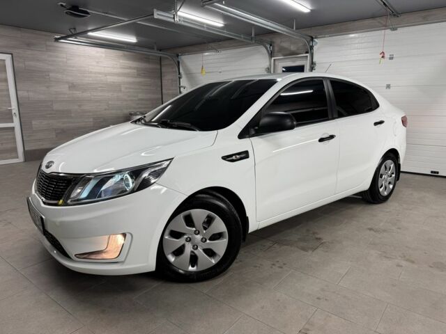 Белый Киа Рио, объемом двигателя 1.4 л и пробегом 167 тыс. км за 7500 $, фото 1 на Automoto.ua