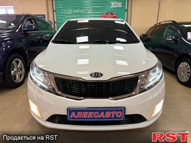 Белый Киа Рио, объемом двигателя 1.4 л и пробегом 167 тыс. км за 7500 $, фото 1 на Automoto.ua