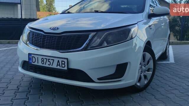 Білий Кіа Ріо, об'ємом двигуна 1.4 л та пробігом 168 тис. км за 7800 $, фото 1 на Automoto.ua