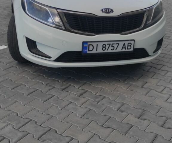 Белый Киа Рио, объемом двигателя 1.4 л и пробегом 168 тыс. км за 6800 $, фото 1 на Automoto.ua