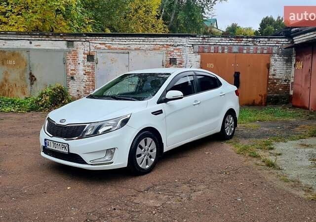 Белый Киа Рио, объемом двигателя 1.59 л и пробегом 158 тыс. км за 8400 $, фото 1 на Automoto.ua