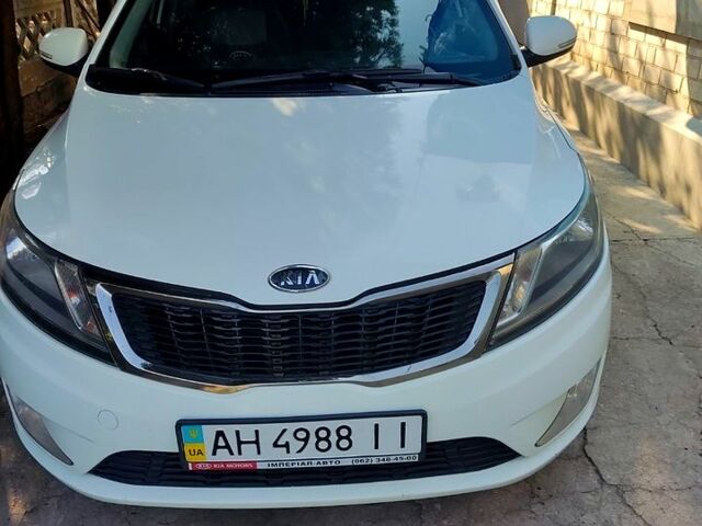 Білий Кіа Ріо, об'ємом двигуна 1.6 л та пробігом 128 тис. км за 7200 $, фото 1 на Automoto.ua