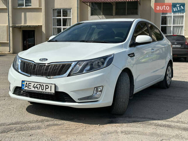 Белый Киа Рио, объемом двигателя 1.4 л и пробегом 96 тыс. км за 8700 $, фото 1 на Automoto.ua