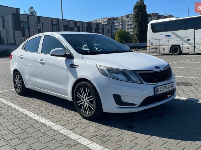 Белый Киа Рио, объемом двигателя 1.4 л и пробегом 228 тыс. км за 6700 $, фото 1 на Automoto.ua