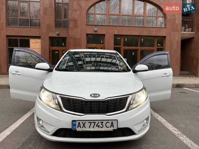Білий Кіа Ріо, об'ємом двигуна 1.6 л та пробігом 91 тис. км за 8600 $, фото 1 на Automoto.ua