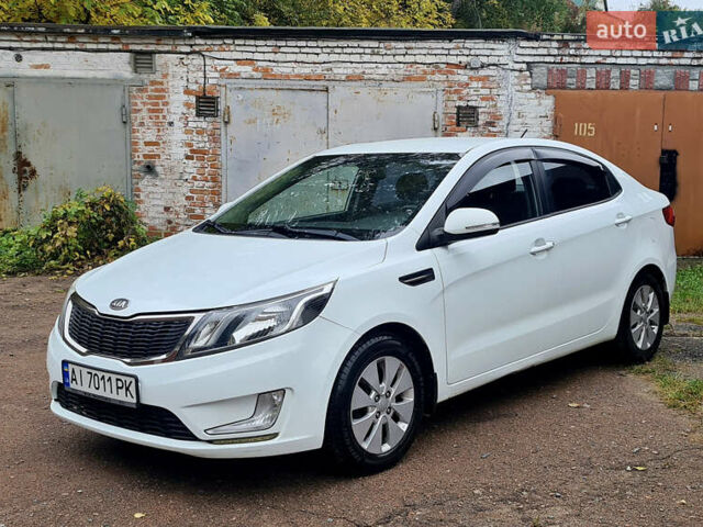 Белый Киа Рио, объемом двигателя 1.59 л и пробегом 159 тыс. км за 8800 $, фото 1 на Automoto.ua