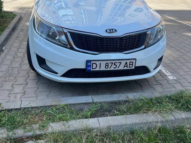 Білий Кіа Ріо, об'ємом двигуна 1.4 л та пробігом 171 тис. км за 6800 $, фото 1 на Automoto.ua