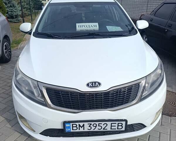 Білий Кіа Ріо, об'ємом двигуна 1.4 л та пробігом 203 тис. км за 6500 $, фото 1 на Automoto.ua