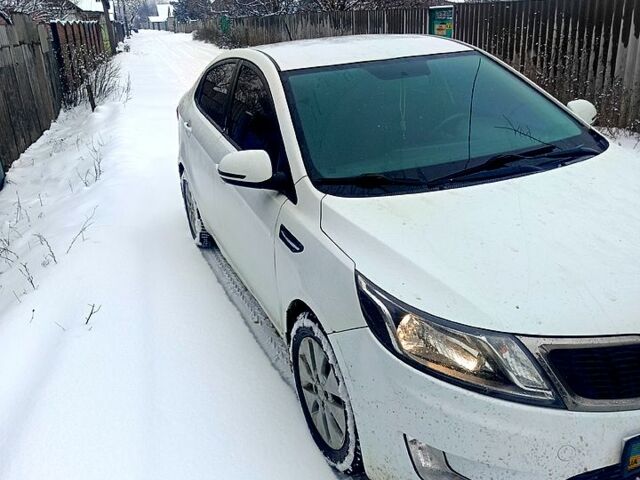 Белый Киа Рио, объемом двигателя 1.6 л и пробегом 168 тыс. км за 4999 $, фото 1 на Automoto.ua