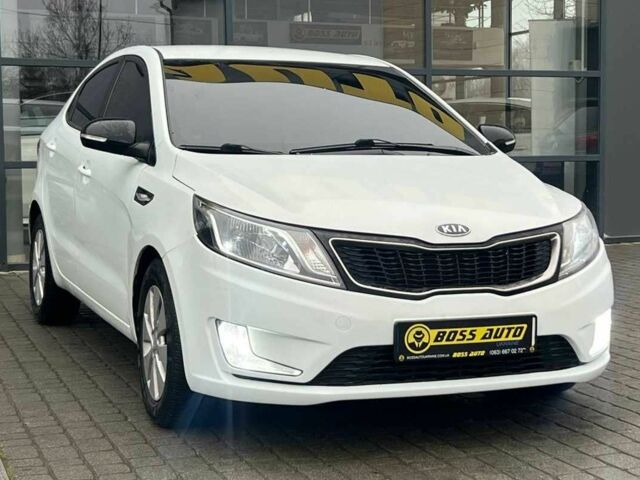 Белый Киа Рио, объемом двигателя 1.6 л и пробегом 150 тыс. км за 7100 $, фото 1 на Automoto.ua