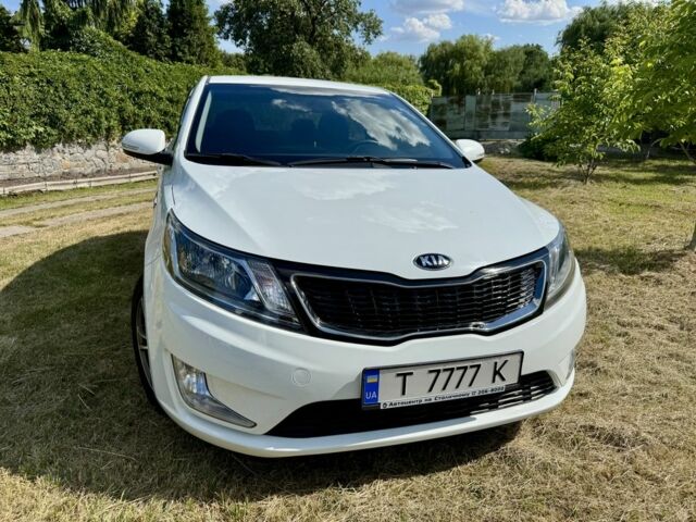 Білий Кіа Ріо, об'ємом двигуна 1.6 л та пробігом 117 тис. км за 10900 $, фото 1 на Automoto.ua