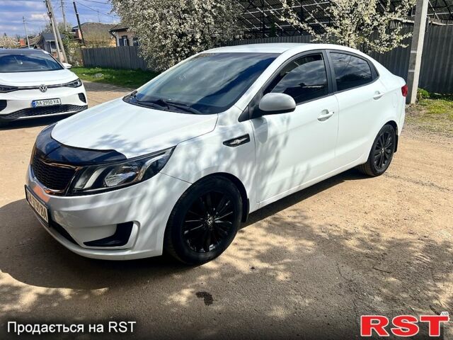 Белый Киа Рио, объемом двигателя 1.4 л и пробегом 260 тыс. км за 6250 $, фото 1 на Automoto.ua